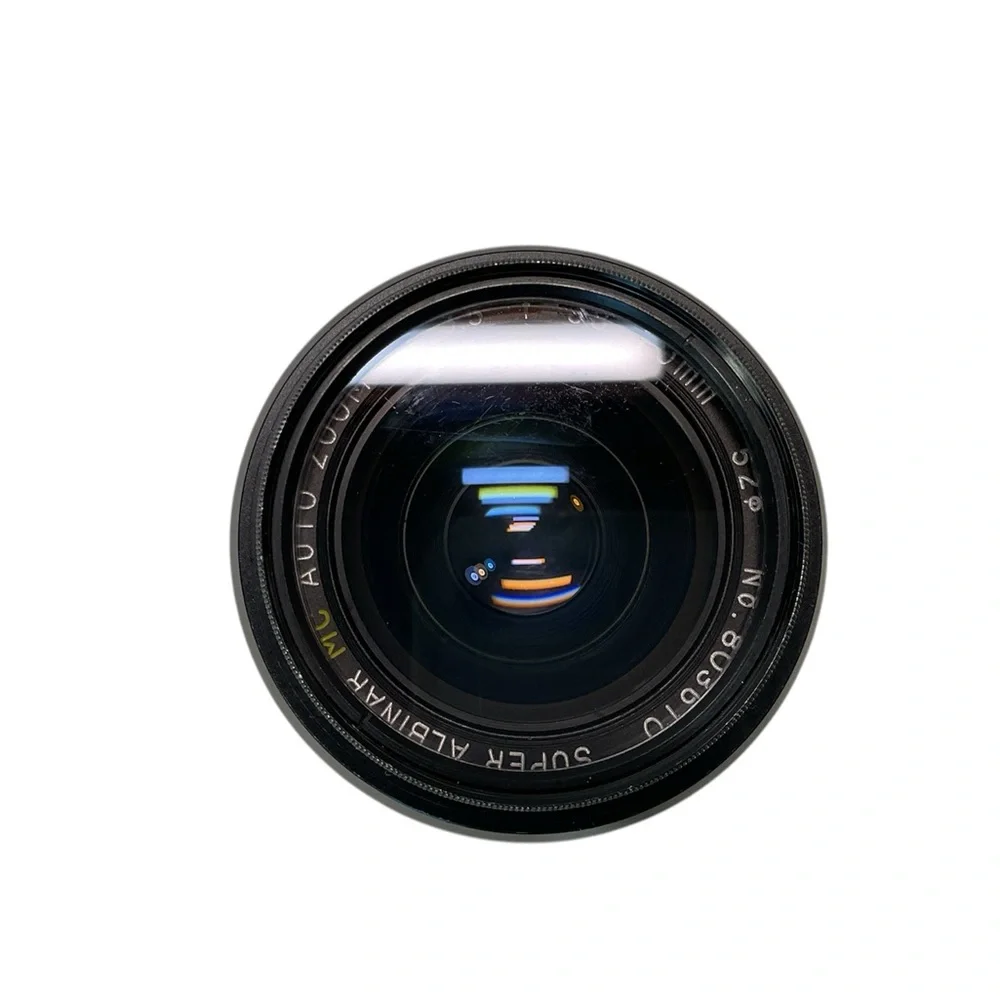 Canon T70 auto wind film camera with zoom lens , 2X converter and flash